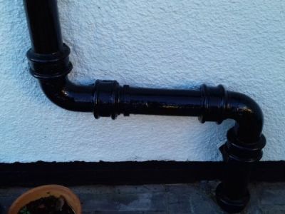 painted drain and wall